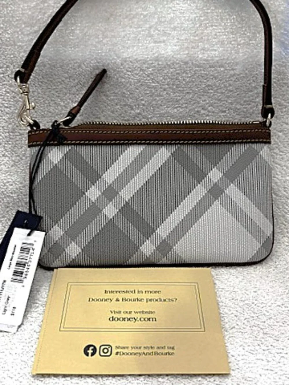 Dooney & Bourke large slim wristlet in Light Gray plaid NWT